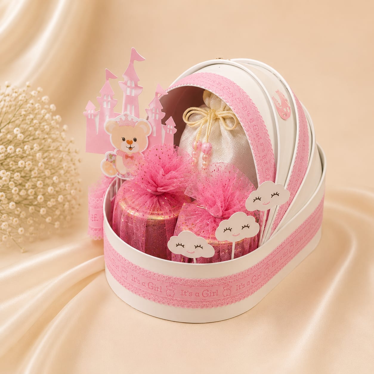 Choko Delights pink striped round gift basket with ribbon bows and dried flower embellishment